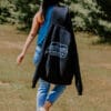 walking_away_with_zip_up